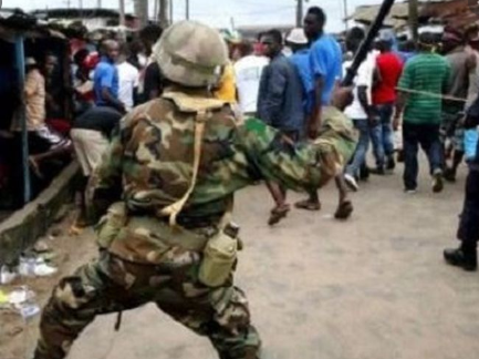 soldiers beat up man