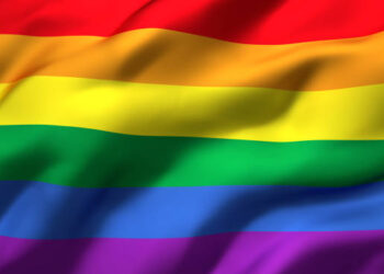Rainbow flag blowing in the wind. Full page LGBT flying flag. 3D illustration.