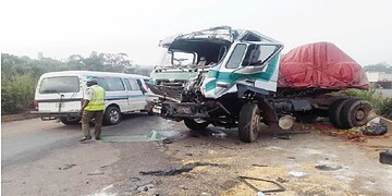 Damaged truck collision with a minibus on the road after an accident, emergency response scene, commercial vehicle crash, traffic accident scene, accident investigation for roadway safety.