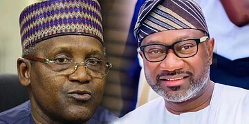 Prominent Nigerian political leaders engaged in a discussion at a formal event, wearing traditional attire and hats, highlighting leadership and cultural heritage.