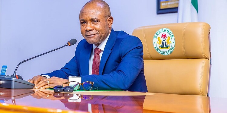 Senior government official at Enugu State Government Office, Nigeria, during official duties or press conference, showcasing leadership and governance in Nigeria.