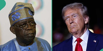Elderly African man wearing traditional blue attire and glasses alongside a portrait of Donald Trump in a dark setting.