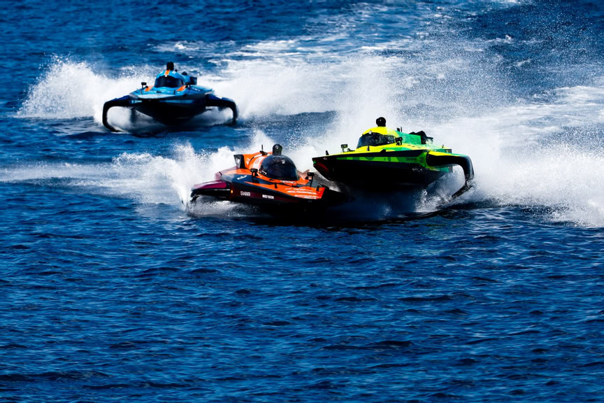 High-speed powerboats racing on open water, capturing action and adrenaline, offshore racing, motorsport, marine sports, competitive boat racing, speed and thrill.