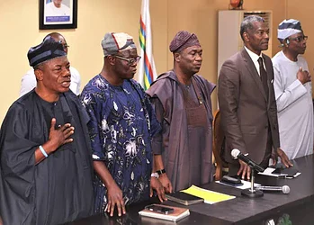 Somali officials and government representatives during a formal meeting or press conference at Freelanews headquarters, showcasing political leadership and governance.