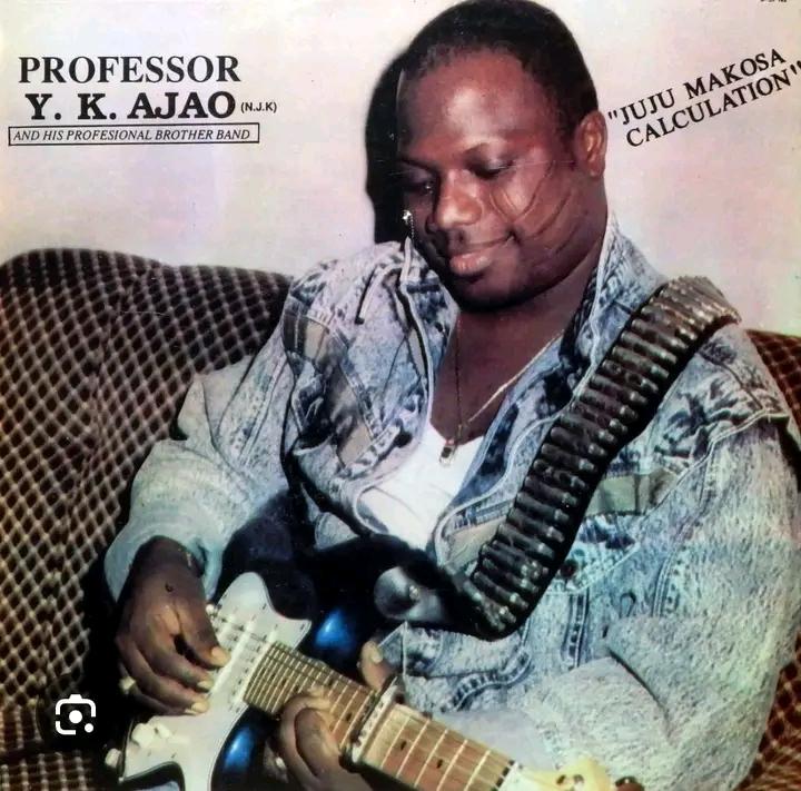 Professor Y.K. Ajao performing Juju music live