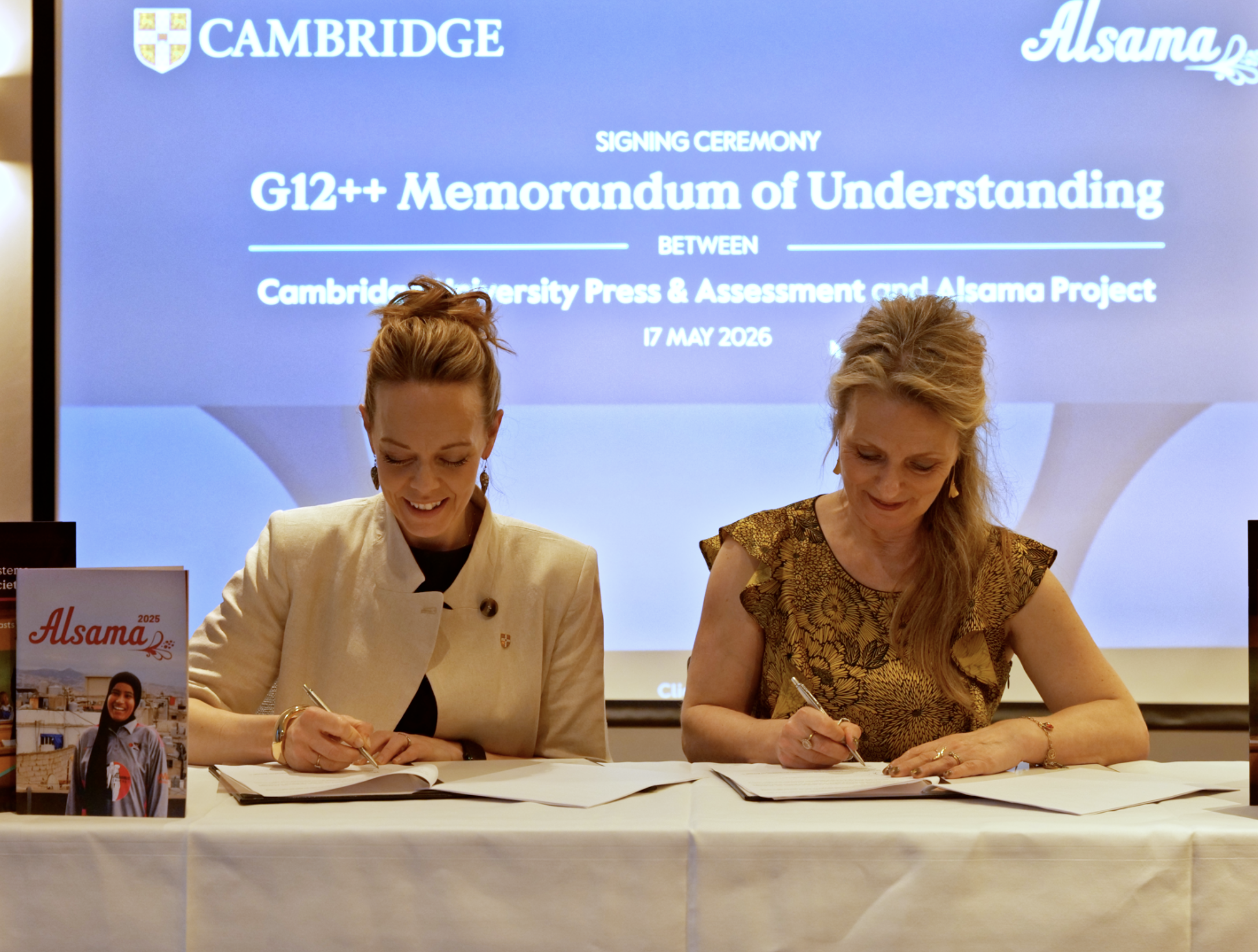 Jane Mann Cambridge and Meike Ziervogel Alsama Project sign agreement. Credit Cambridge 2