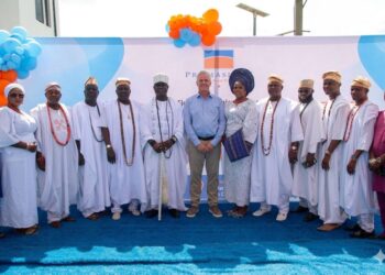 Chief Executive Officer of Promasidor Nigeria, François Gillet (Middle), with His Royal Majesty, Oba Isa Abiodun Faronbi-Shekoni, the Osolo of Isolo Kingdom (5th Left); his wife, Olori Tawakalitu Abike Faronbi-Shekoni (6th Right); and members of the royal cabinet, during the donation of a water tower and borehole system to the palace of the Osolo of Isolo Kingdom in Lagos, on Thursday, 21st May 2026.