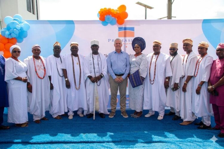 Chief Executive Officer of Promasidor Nigeria, François Gillet (Middle), with His Royal Majesty, Oba Isa Abiodun Faronbi-Shekoni, the Osolo of Isolo Kingdom (5th Left); his wife, Olori Tawakalitu Abike Faronbi-Shekoni (6th Right); and members of the royal cabinet, during the donation of a water tower and borehole system to the palace of the Osolo of Isolo Kingdom in Lagos, on Thursday, 21st May 2026.